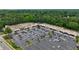 Aerial view of a commercial area with a large parking lot, perfect for retail or business at 359 Alderwood Ln, Atlanta, GA 30328