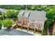 Aerial view of two-story townhomes showcasing private decks and well-kept surroundings at 359 Alderwood Ln, Atlanta, GA 30328