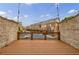 Private wood balcony overlooking the neighborhood's townhomes on a beautiful sunny day at 359 Alderwood Ln, Atlanta, GA 30328