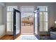 Balcony that overlooks neighboring townhomes and has beautiful French doors at 359 Alderwood Ln, Atlanta, GA 30328