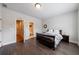 Bedroom boasts hardwood floors with access to an ensuite bathroom at 359 Alderwood Ln, Atlanta, GA 30328