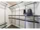 A well-organized walk-in closet boasts metal shelving, providing an efficient and stylish storage solution at 359 Alderwood Ln, Atlanta, GA 30328
