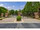 Gated entrance to the Alderwood community with brick pillars and landscaped grounds at 359 Alderwood Ln, Atlanta, GA 30328