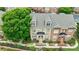 Beautiful three story brick townhome with dormer windows and professional landscaping at 359 Alderwood Ln, Atlanta, GA 30328