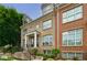 Charming brick townhome with well-maintained landscaping and inviting front entrance at 359 Alderwood Ln, Atlanta, GA 30328