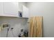 A functional laundry room with shelving and cabinets ready for customization at 359 Alderwood Ln, Atlanta, GA 30328