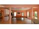 Spacious game room with a pool table and a view into the kitchen at 3740 Duckcove Way, Cumming, GA 30041
