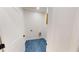 Bright laundry room featuring blue tile floors and white walls and trim at 3774 Eli Dr, Snellville, GA 30039