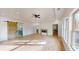 Large main bedroom boasts hardwood floors, fireplace, and bathroom with a barn door at 3774 Eli Dr, Snellville, GA 30039
