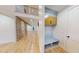 Functional mudroom with built-in bench, storage cabinets, hooks, and easy access to the main living area at 3774 Eli Dr, Snellville, GA 30039