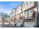 Beautiful row of townhomes, each with a private balcony and attached garage at 4462 Dandelion Ln, Atlanta, GA 30342