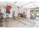 Spacious garage with ample storage space, including overhead shelving and room for multiple vehicles at 4462 Dandelion Ln, Atlanta, GA 30342