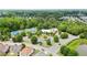 Aerial view showcases community amenities including a pool and tennis courts at 4630 Roseman Trl, Cumming, GA 30040