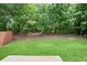 Large backyard featuring well-maintained lawn at 4630 Roseman Trl, Cumming, GA 30040