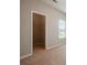 Bedroom showing the entrance to a walk-in closet with wire shelving for storage at 4630 Roseman Trl, Cumming, GA 30040