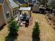 An aerial shot showcasing a backyard with a gazebo and storage shed in a well-maintained outdoor space at 492 Thorn Creek Way, Dallas, GA 30157