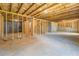 A spacious unfinished basement provides ample room for storage and creative build-out opportunities at 9183 Golfview Cir, Covington, GA 30014