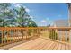 Spacious wooden deck with beautiful views of mature trees at 9183 Golfview Cir, Covington, GA 30014