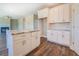 Bright kitchen featuring white cabinets, granite countertops and stainless steel appliances at 9183 Golfview Cir, Covington, GA 30014