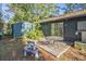 Cozy backyard with a small patio perfect for outdoor dining and a storage shed for convenience at 161 Aaron Ct, Riverdale, GA 30274