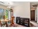 Cozy dining space with a stylish cabinet, offering a blend of comfort and functionality at 161 Aaron Ct, Riverdale, GA 30274