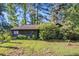 Charming single-story home with a lush, tree-filled yard, offering a serene and private setting at 161 Aaron Ct, Riverdale, GA 30274