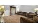 Inviting living room featuring plush seating, warm carpeting, and natural light, creating a cozy atmosphere at 161 Aaron Ct, Riverdale, GA 30274