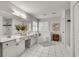 Bright main bathroom with double vanity, soaking tub, and separate shower at 3007 Frazier Ct, Decatur, GA 30033