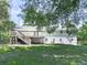 Home featuring a wooden deck offering outdoor space and access to backyard at 3163 Old 41 Nw Hwy, Kennesaw, GA 30144