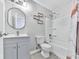 Bathroom with tub/shower combo, vanity, lighting, and mirror at 3163 Old 41 Nw Hwy, Kennesaw, GA 30144