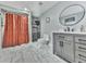 Modern bathroom features a single vanity and a shower with a decorative curtain at 3163 Old 41 Nw Hwy, Kennesaw, GA 30144