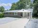 Charming single-story home with a brick facade and a well-maintained lawn at 3163 Old 41 Nw Hwy, Kennesaw, GA 30144
