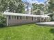 Charming brick home featuring a well-maintained lawn and inviting front porch at 3163 Old 41 Nw Hwy, Kennesaw, GA 30144