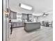 Spacious kitchen with gray cabinets, central island, and stainless steel appliances at 3163 Old 41 Nw Hwy, Kennesaw, GA 30144