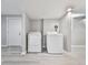 Functional laundry area with modern white washer and dryer units at 3163 Old 41 Nw Hwy, Kennesaw, GA 30144