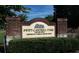 An inviting Swift-Cantrell Park sign with manicured shrubs and lush greenery welcomes visitors at 3163 Old 41 Nw Hwy, Kennesaw, GA 30144