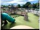 An extensive playground featuring slides, climbing structures and ample seating, all surrounded by green turf at 3163 Old 41 Nw Hwy, Kennesaw, GA 30144