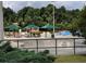 Outdoor skate park, picnic tables and umbrellas surrounded by mature trees, and a grassy area at 3163 Old 41 Nw Hwy, Kennesaw, GA 30144