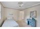 Comfortable and inviting bedroom with neutral tones, a ceiling fan, and natural light at 3999 Saint Clair Ne Ct, Brookhaven, GA 30319