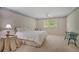 Spacious bedroom with neutral carpet, natural light, and a decorative border at 3999 Saint Clair Ne Ct, Brookhaven, GA 30319
