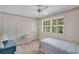 Bright and airy bedroom featuring a soft color palette, a ceiling fan, and natural light at 3999 Saint Clair Ne Ct, Brookhaven, GA 30319