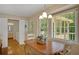 Cozy dining area with large windows and views of the exterior, located adjacent to the bathroom at 3999 Saint Clair Ne Ct, Brookhaven, GA 30319
