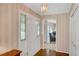 Inviting foyer with hardwood floors, closet, and a view of the living space, offering a warm welcome at 3999 Saint Clair Ne Ct, Brookhaven, GA 30319
