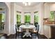 Cozy breakfast nook with a bay window, offering plenty of natural light and space for a dining table at 6140 Stillwood Ln, Cumming, GA 30041