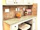Granite countertop desk nook area with storage at 6140 Stillwood Ln, Cumming, GA 30041