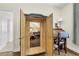 Hidden door leading to storage room with desk and chair at 122 Griffin Way, Canton, GA 30115