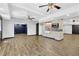 Finished basement featuring a stylish kitchenette, open space, and neutral finishes with modern lighting at 122 Griffin Way, Canton, GA 30115