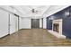 Spacious finished basement featuring modern flooring, fireplace, and ample room for entertaining at 122 Griffin Way, Canton, GA 30115
