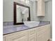 Modern bathroom featuring stylish vanity with vessel sink, elegant mirror, and contemporary fixtures at 122 Griffin Way, Canton, GA 30115