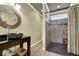 Bathroom featuring a stone sink and tiled shower at 122 Griffin Way, Canton, GA 30115